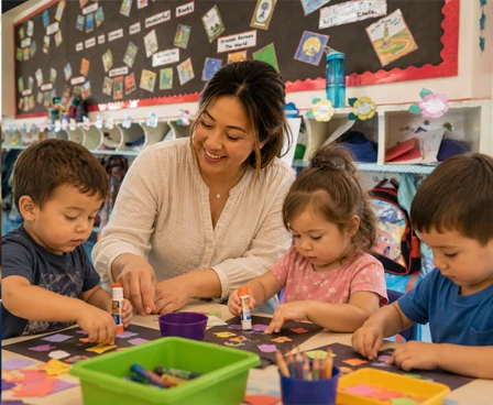 A teacher and children doing a craft activity